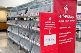 kohls self pickup sign and bins inside of a kohls store