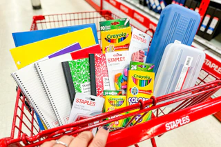staples shopping cart with school supplies
