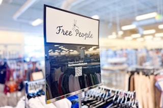 A free people sign in a store