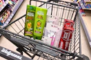 garnier fructis shampoo, colgate toothpaste, and walgreens razors in a cart