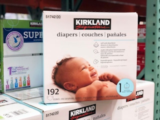 a box of kirkland signature diapers in size 1 on the shelf at costco