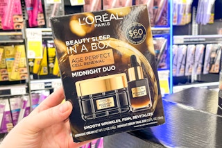 hand holding skincare gift set