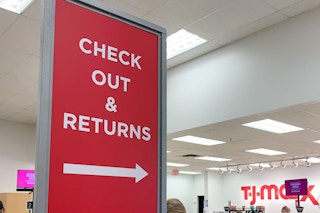 Check out and returns sign