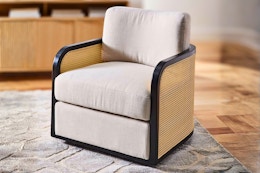 Lifestyle image of the Better Homes & Gardens Swivel Cane Accent Chair