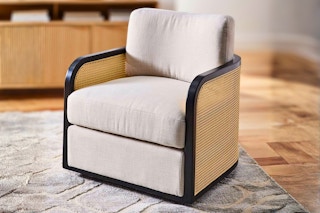 Lifestyle image of the Better Homes & Gardens Swivel Cane Accent Chair