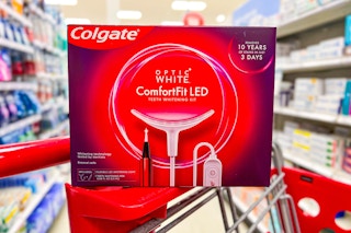 colgate teeth whitening kit sitting on a target cart