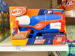 nerf agility blaster sitting on a target shelf