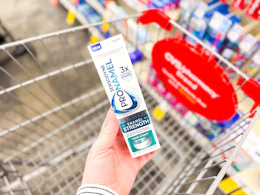 hand holding sensodyne clinical in cvs