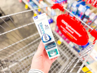 hand holding sensodyne clinical in cvs