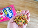 Hand holding Nerd gummy clusters