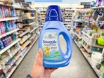 hand holding snuggle laundry item in walgreens
