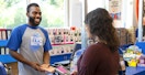 five below customer checking out with cashier