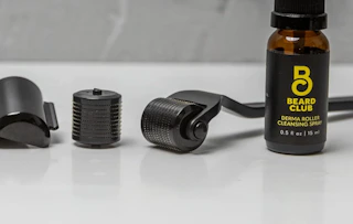 a beard spray and derma roller