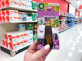 hand holding air wick essential mist refill clearance at target