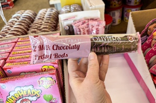 hand holding olivers chocolate pretzels clearance