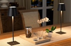 two table lamp on a dining room table 