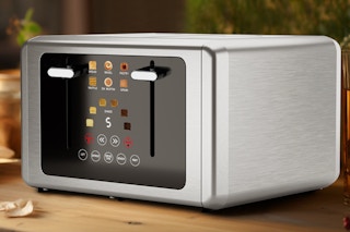 The 4-Slice touchscreen toaster sitting on a table top.