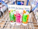 three bottles of St. Ives face scrub in a Walmart cart