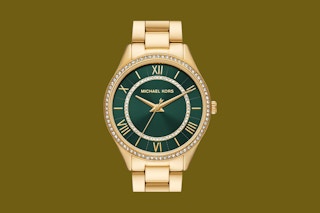 a woman wearing a michael kors watch