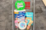 shopping cart with Pantene, Charmin, Gain, and more products
