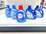 persil, snuggle, and purex sitting on a target shelf