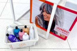 Ulta jumbo shampoos and conditioners in a basket in front of a sign