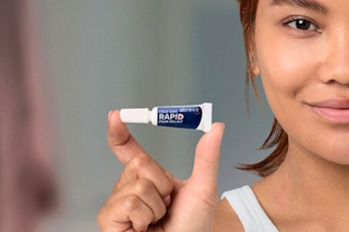 Person holding Abreva Cold Sore Treatment