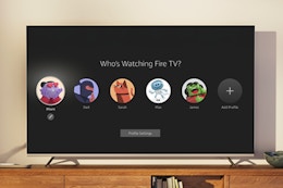 INSIGNIA 50" Class F50 Series LED 4K UHD Smart Fire TV on a console.