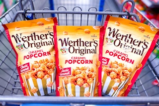 3 bags of werthers caramel popcorn in a cart