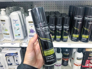 hand holding tresemme hairspray at target