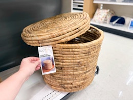 room essentials woven storage ottoman sitting on a target shelf