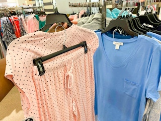 hand holding up pajama set