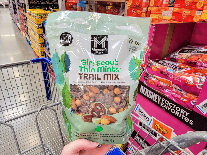 hand holding a bag of girl scout thin mint trail mix
