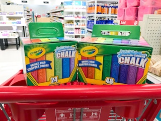 a 24- and 48-count of Crayola sidewalk chalk on a red Target cart