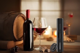 Electric wine opener on table. B08D8XHNXQ
