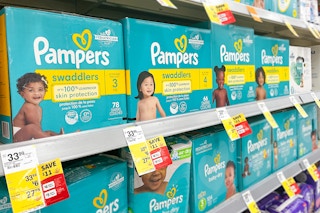 shelf with pampers diaper boxes and sale tags