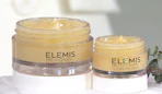 two yellow glass jar cleansing balms