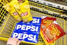 2 bags of lays, 3 12-packs of pepsi, and 2 boxes of honey nut cheerios in a cart