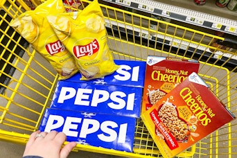 2 bags of lays, 3 12-packs of pepsi, and 2 boxes of honey nut cheerios in a cart