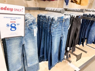 jeans on hangers in store at old navy