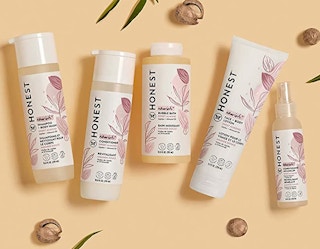 the honest company products on a peach background