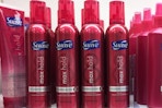 suave max hold hairspray on store shelf