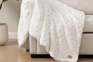 Throw blanket on chair. B08KTQVGDN