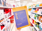 hand holding a levoit humidifier in a target aisle
