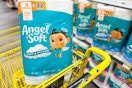 angel soft toilet paper in a yellow shopping cart