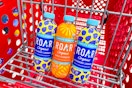 3 roar enhanced drinks sitting in a target cart