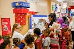 a party of kids at Build A Bear Workshop