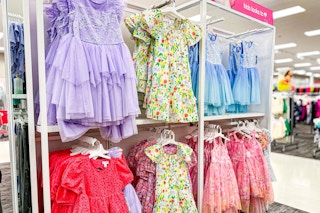 children's dresses sitting on a target rack