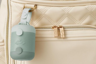 a pacifier holder on a bag