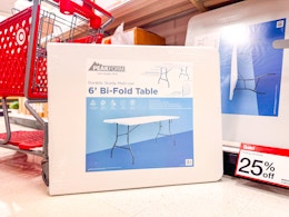 peakform folding banquet table sitting in front of a target shelf